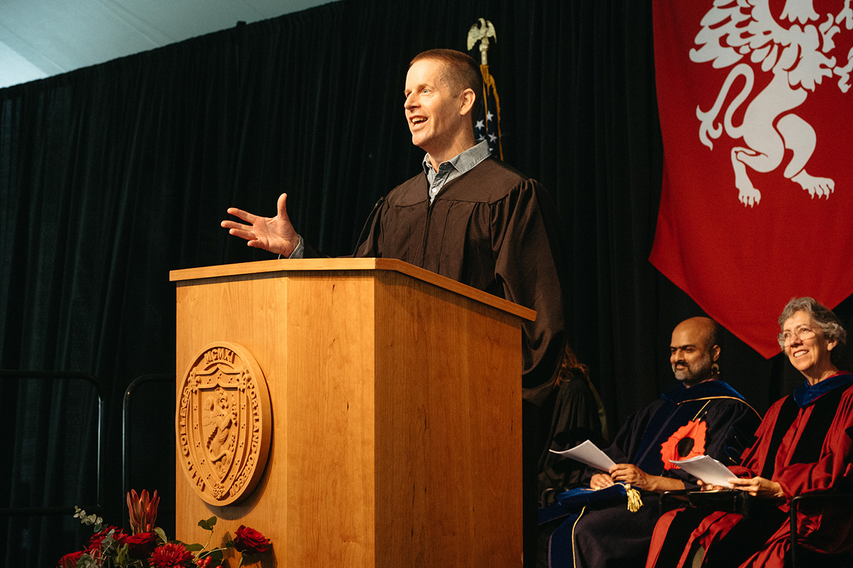 Reed Professor of Creative Writing Peter Rock giving the Hum lecture under the Convocation tent