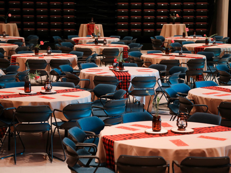 Tables and chairs laid out with holiday decor