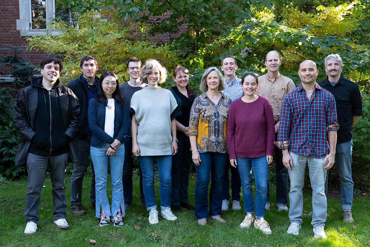 A group photo of the math-stats department faculty standing outside