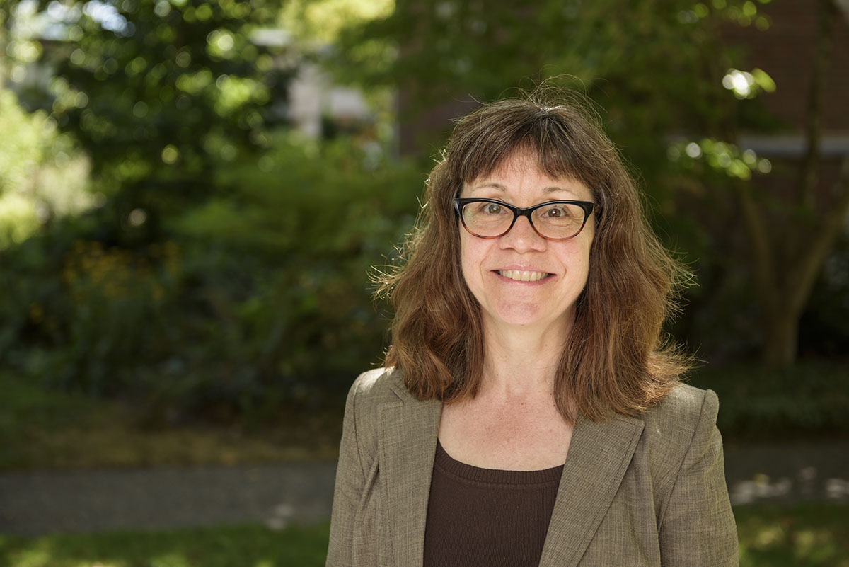 Headshot of woman outdoors