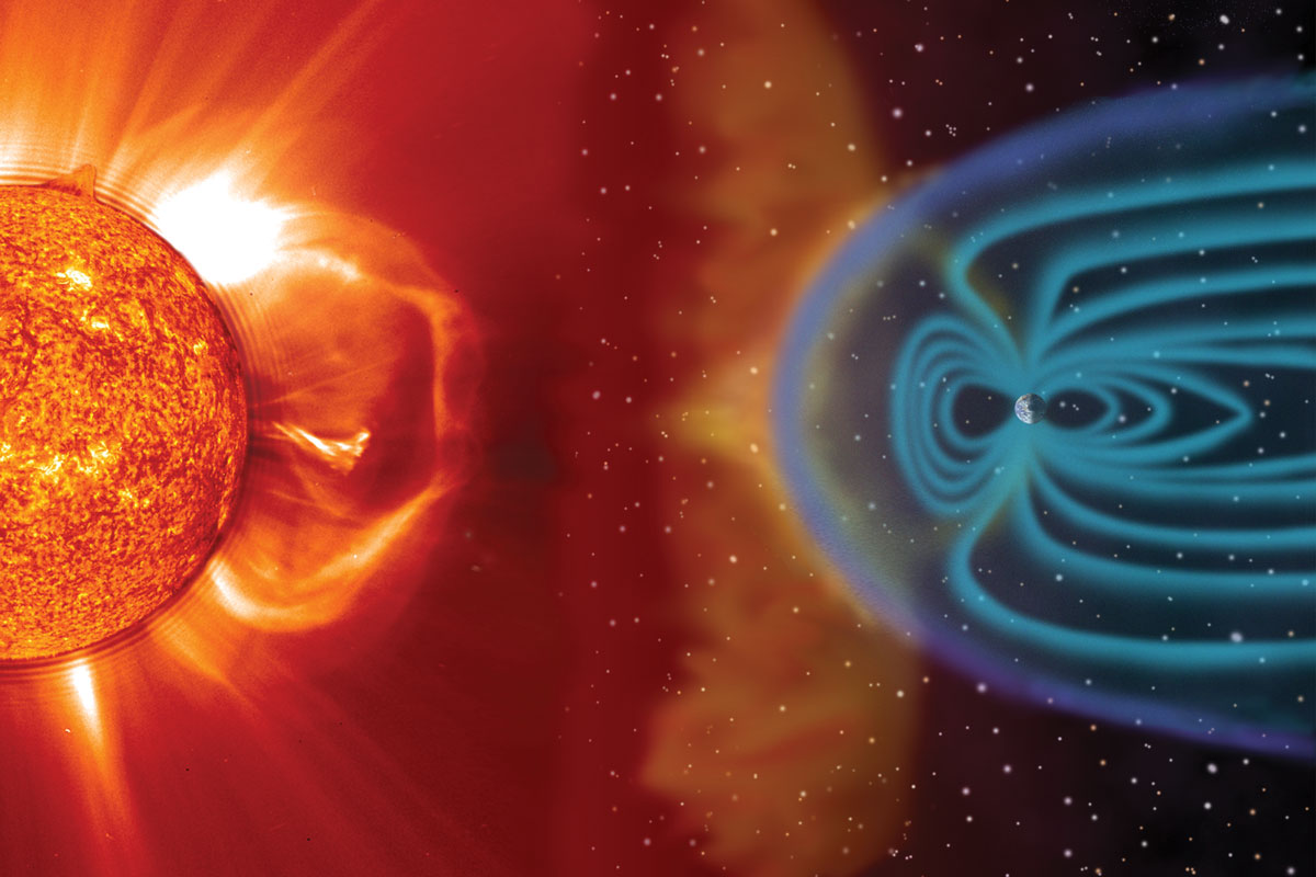 The sun shoots out red plasma, hitting the blue magnetic fields of Earth.